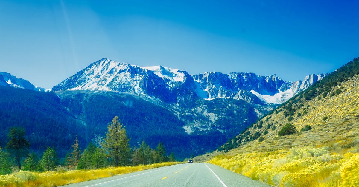 Is it possible to hike the Carpathian Mountains as a 2 or 3 day trip staying in Poland? - Grey Concrete Road Towards Mountain Is it possible to hike the Carpathian Mountains as a 2 or 3 day trip staying in Poland? - Grey Concrete Road Towards Mountain