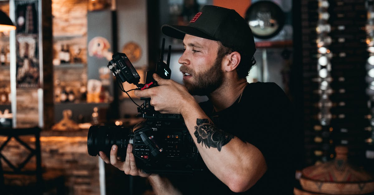 Is it possible to hire a tour guy through Iraq with a film crew for a documentary film on Iraq ancient history? - A Bearded Man Shooting a Film Is it possible to hire a tour guy through Iraq with a film crew for a documentary film on Iraq ancient history? - A Bearded Man Shooting a Film