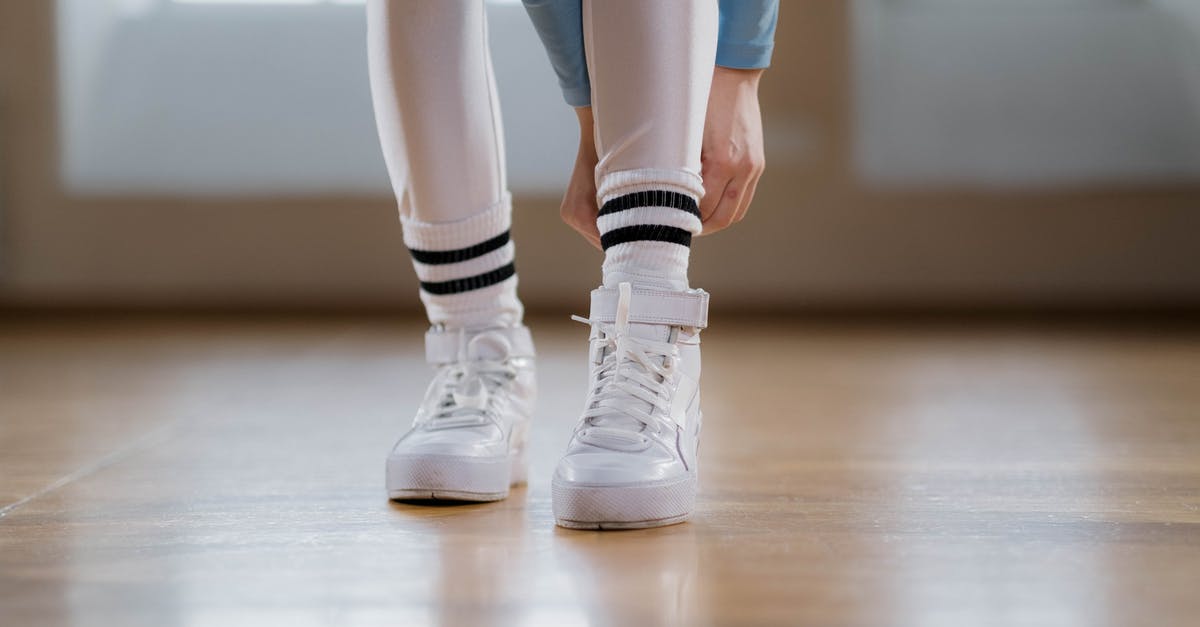 Is it possible to skip some legs of a cruise? - Person in Blue Denim Jeans and White and Black Adidas Sneakers