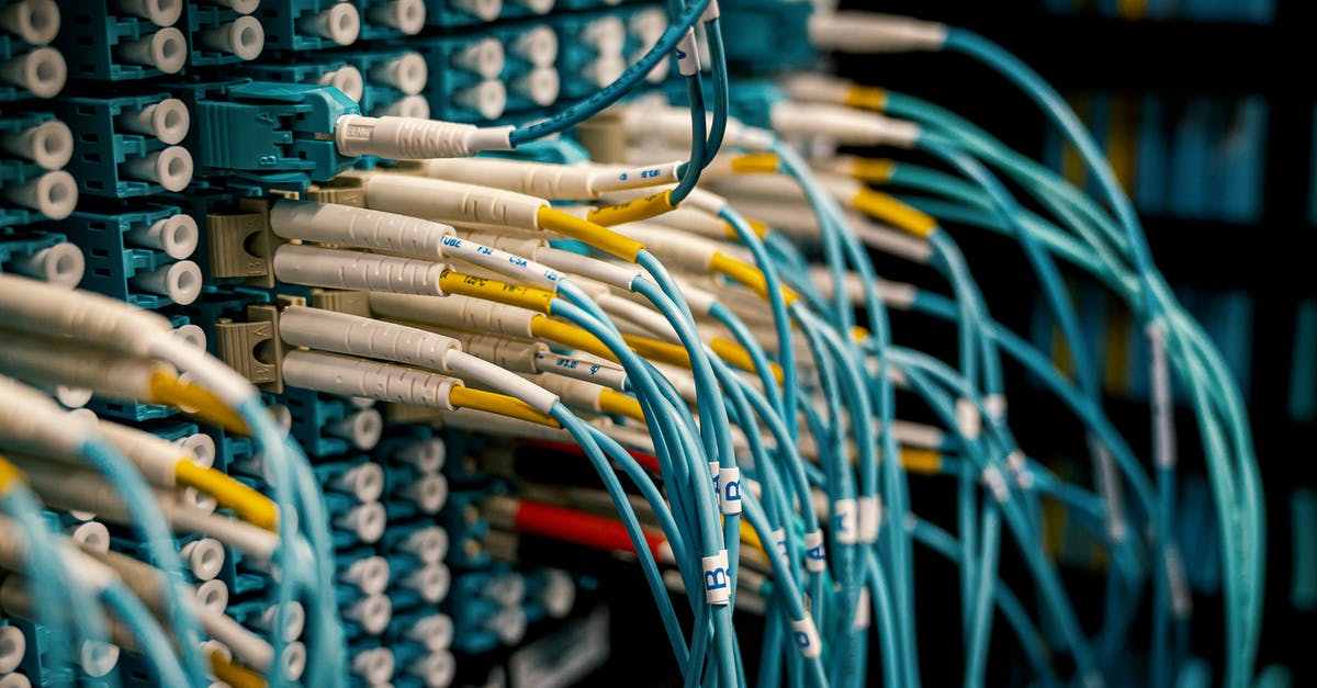 Is it possible to switch terminals at Charles de Gaulle? - Fiber optical device with similar bright connectors with blue cables made of rubber with plastic pigtails on edges