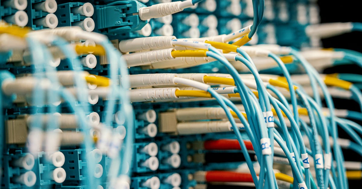 Is it possible to switch terminals at Charles de Gaulle? - Industrial optical switch with connected rubber cables of different colors with stickers representing letters and numbers and plastic terminations