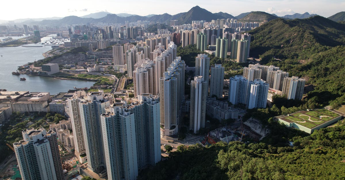 Is it possible to walk between Kowloon and Hong Kong Island? - Aerial View of City Buildings