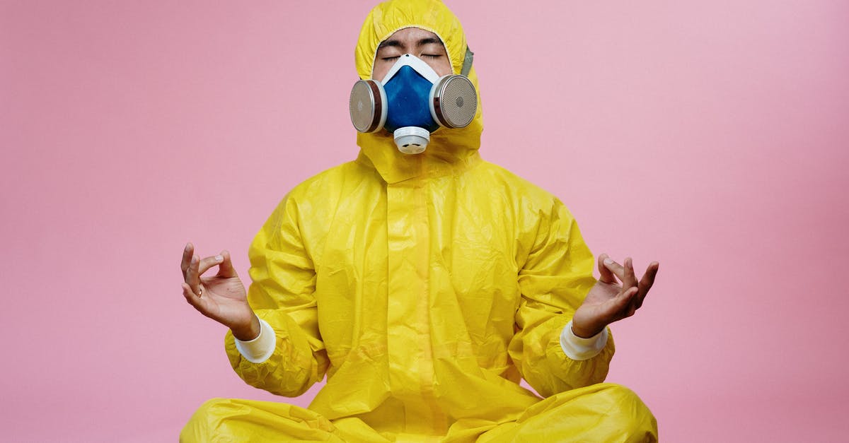 Is it safe for an ESTA waiver visitor to return to Japan until the corona virus has been contained? - Man In Yellow Protective Suit 