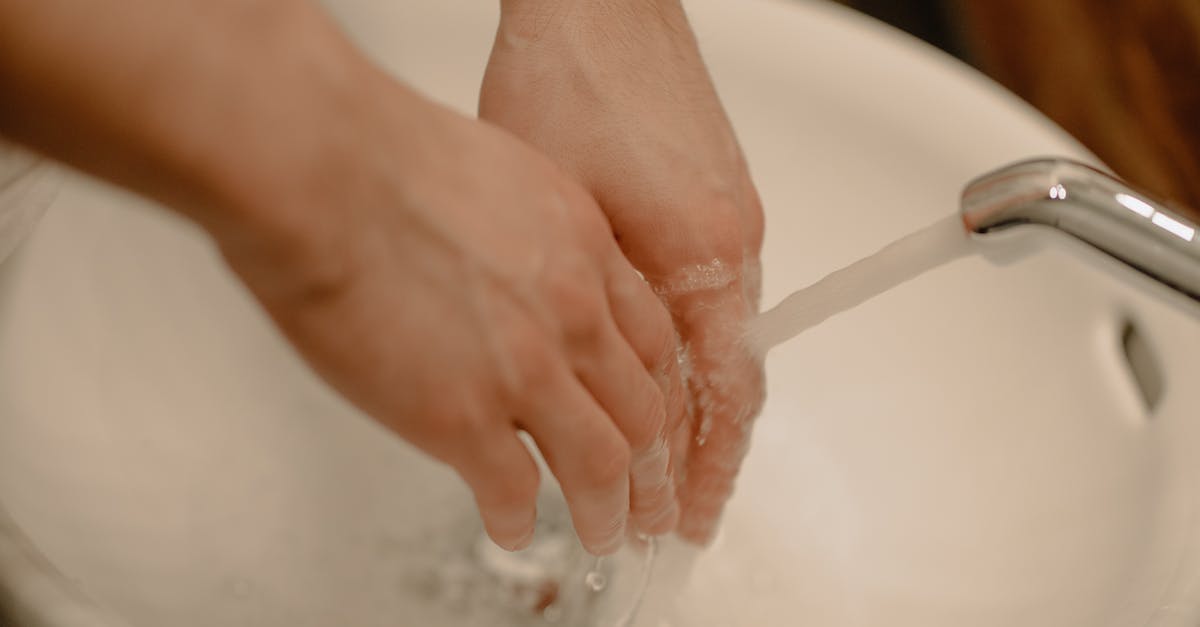 Is it safe to drink tap water in Morocco? - Person Washing Hands