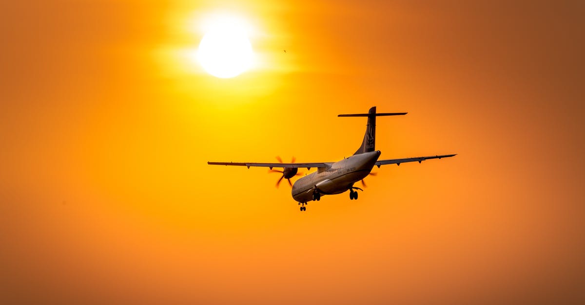 Is it safe to forward airplane ticket to third party? - White and Red Airplane Flying during Sunset