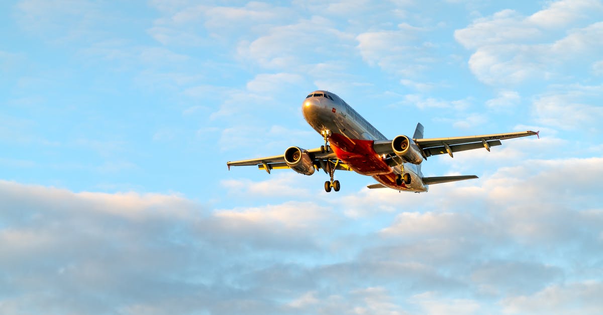 Is it safe to forward airplane ticket to third party? - White and Red Airplane Under Blue Sky