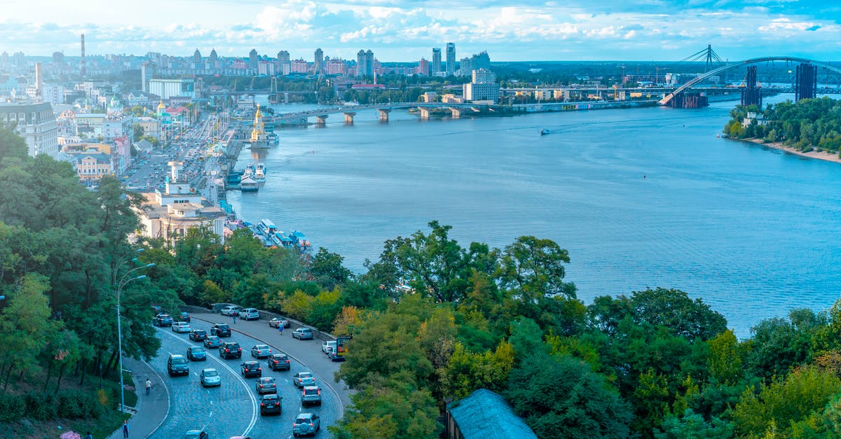 Is it safe to travel to Kiev at the moment? [closed] - Vehicles on Road Beside Sea