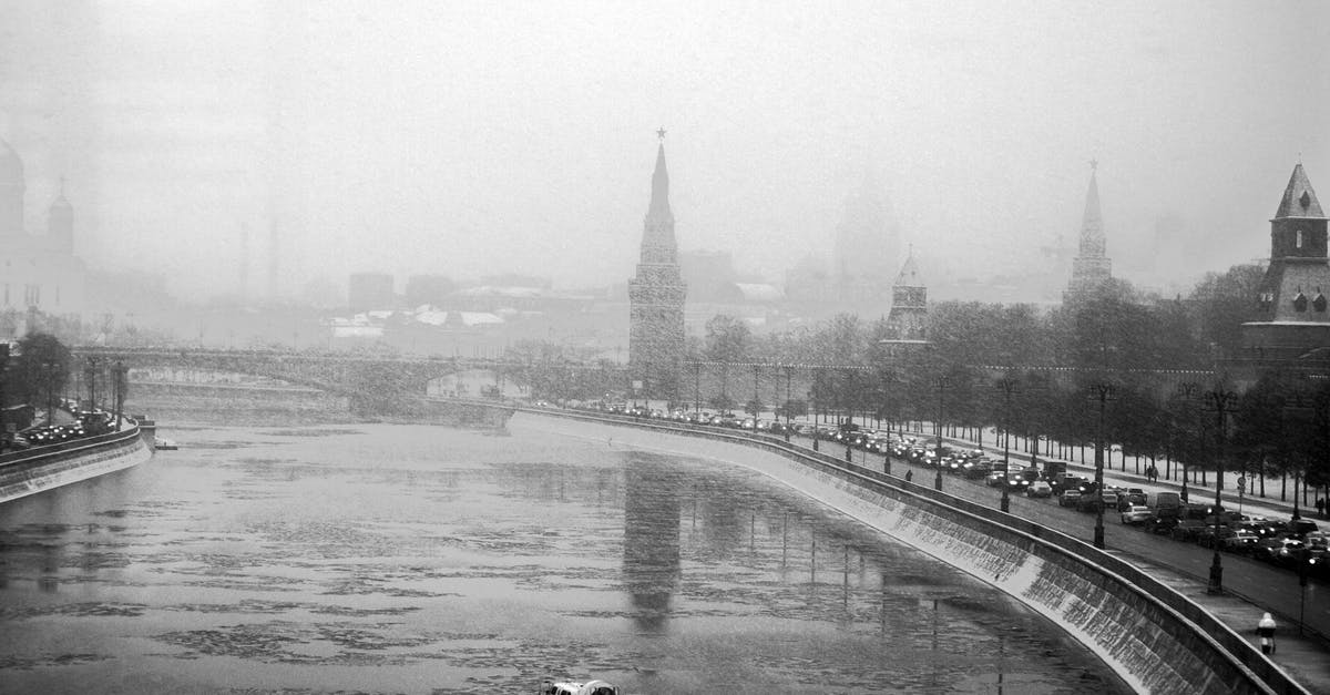 Is it snowing in Moscow in January/February 2020? - Grayscale Photo of a Boat on a River