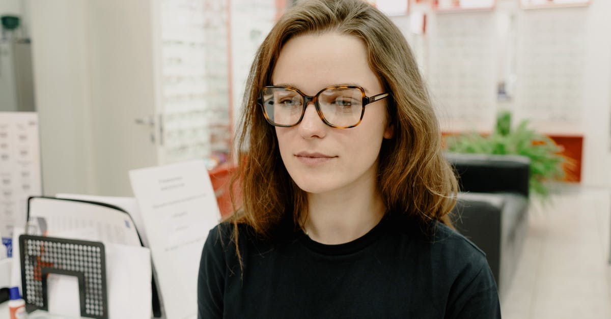 Is possible to visit all Iceland sights in April/May? - Serious woman wearing new eyeglasses