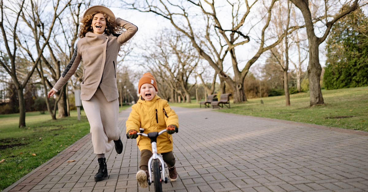 Is riding a bicycle in the parks of Glasgow allowed? - Free stock photo of boy, child, couple