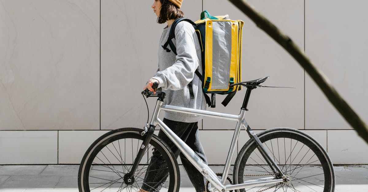 Is Roma bike sharing service active? - Woman Walking on a Sidewalk