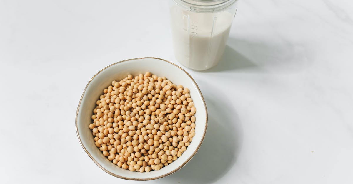 Is soy milk easy to get in Western Europe? - Photo of Soybeans Near Drinking Glass With Soy Milk