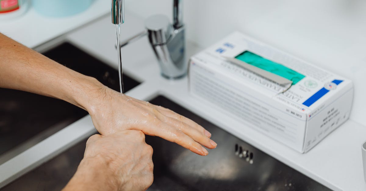 Is tap water in Ireland and England drinkable? - Doctor Washing Hands under Tap Water