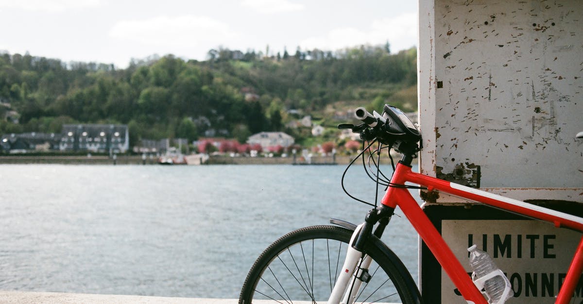 Is the Dunkirk area suitable for bicycling? - Bicycle parked on embankment near river