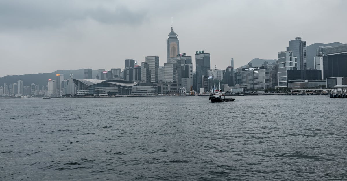 Is the ferry from Hong Kong to Macau crowded during weekends? - The Famous City Buildings at Victoria Harbour in Hong Kong from Across the River