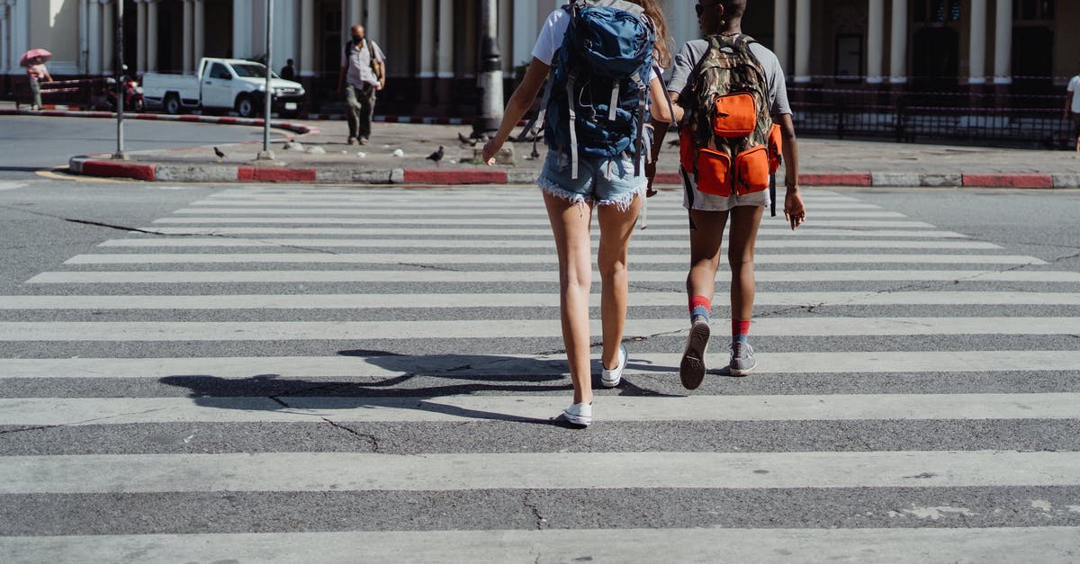 Is the San Ysidro PedWest crossing closed? - Two Friends Crossing the Pedestrian Lane