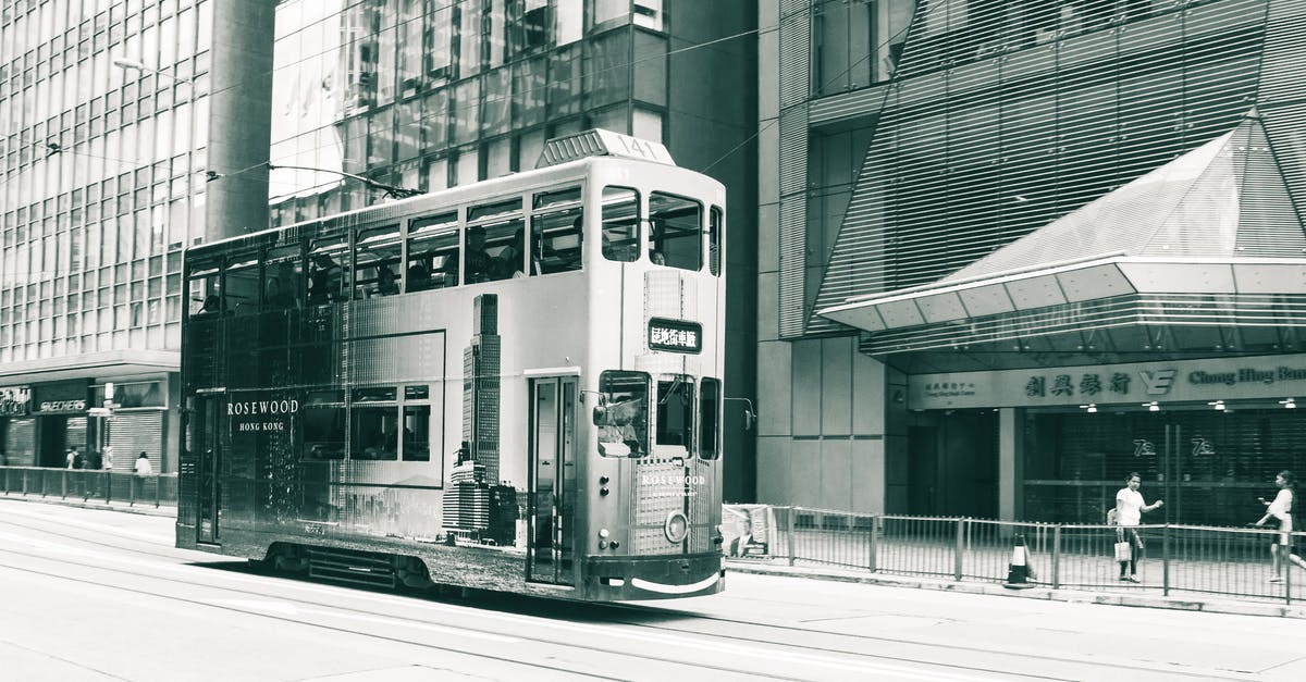 Is the sleeper train from Hong Kong to Shanghai an enjoyable experience? - Double Decker Tram Black and White Photo Is the sleeper train from Hong Kong to Shanghai an enjoyable experience? - Double Decker Tram Black and White Photo