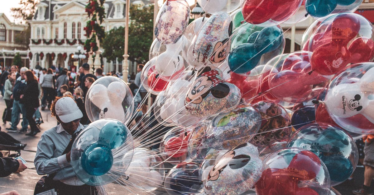 Is the tapwater at Walt Disney World fluoridated? - Photo of Person Holding Balloons