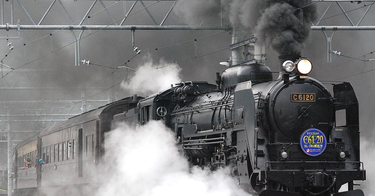 Is the train between Shanghai and Hangzhou smoke-free? - Black Train on Rail and Showing Smoke