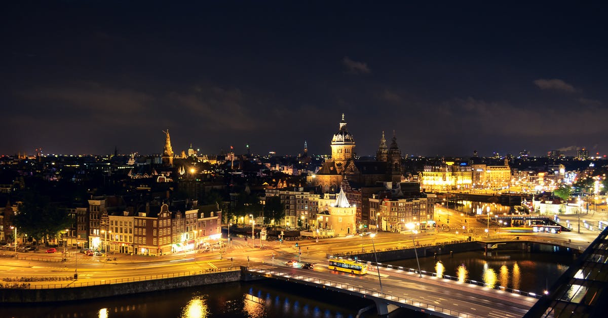 Is there a city in the world with more bridges than Amsterdam, the Netherlands? - Photo of Amsterdam Cityscape at Night