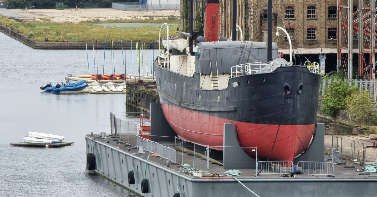 Is there a famous museum about conspiracies? - Black and Red Ship on Dock