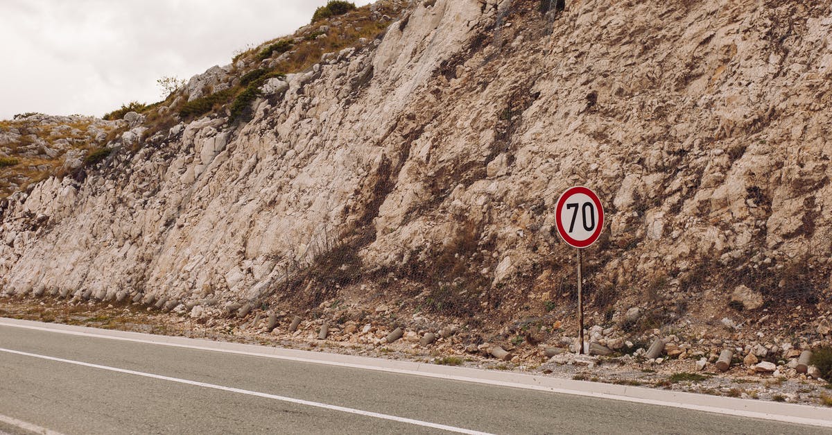 Is there a limit as to what distance airlines deliver delayed baggage? - Rock Formation beside an Empty Road Is there a limit as to what distance airlines deliver delayed baggage? - Rock Formation beside an Empty Road