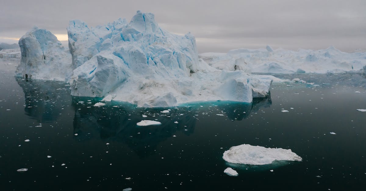 Is there a North American Air Travel Pass? - Ice on Water Near White Ice Formation