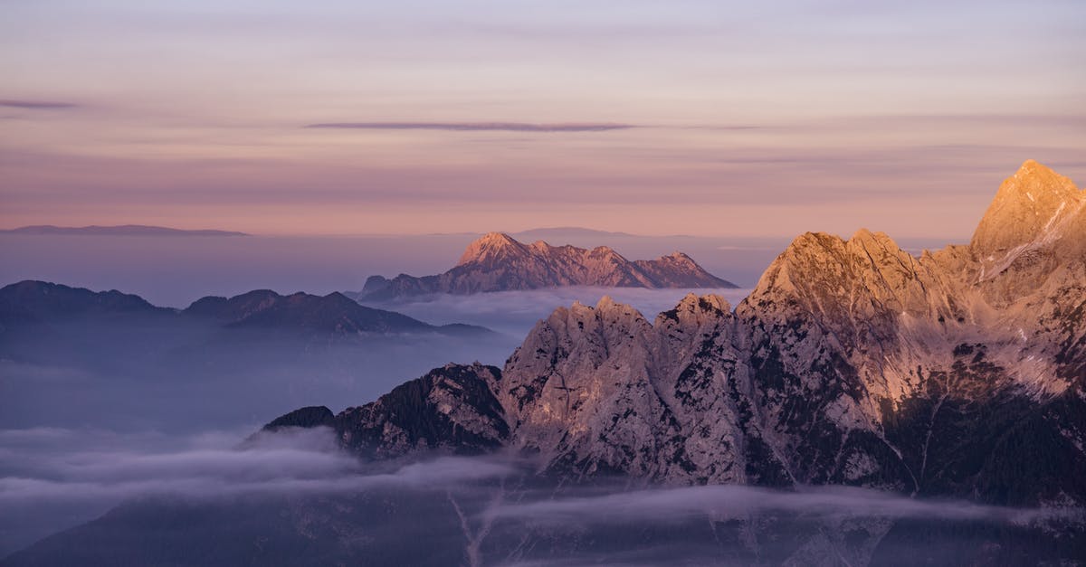 Is there a resource about panoramic views at take-off/landing? - Mountain Ranges Under Orange Sunset