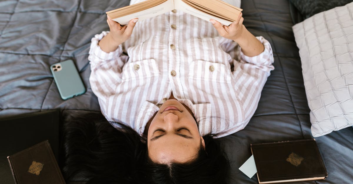 Is there a specific flatshare site covering Scotland? - Woman in White and Blue Button Up Shirt Lying on Bed