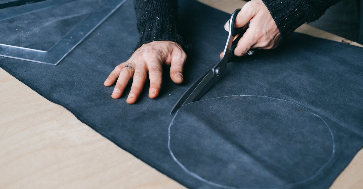 Is there a tool for planning "nested" round trips? - Crop male artisan cutting piece of fabric at workbench