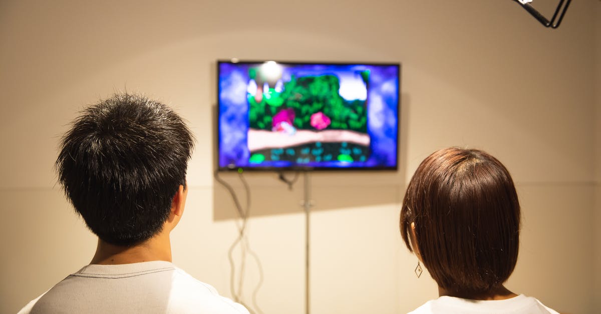 Is there a video game museum anywhere in Europe? - Unrecognizable young couple playing video game at home