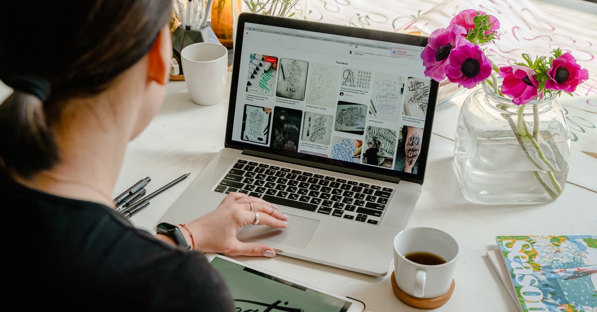 Is there a website dedicated to odd hotels? - Photo Of Person Using Laptop For Graphic Designs 