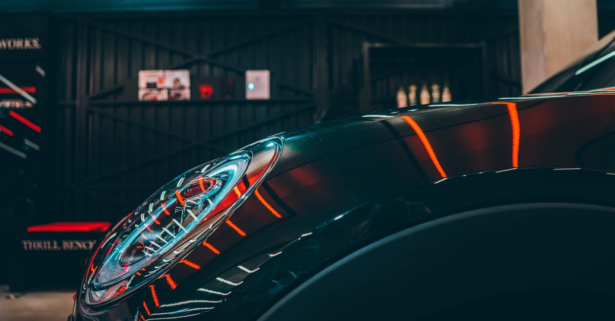 Is there any kind of car museum anywhere in Okinawa? - Black Vehicle Parked Outside 