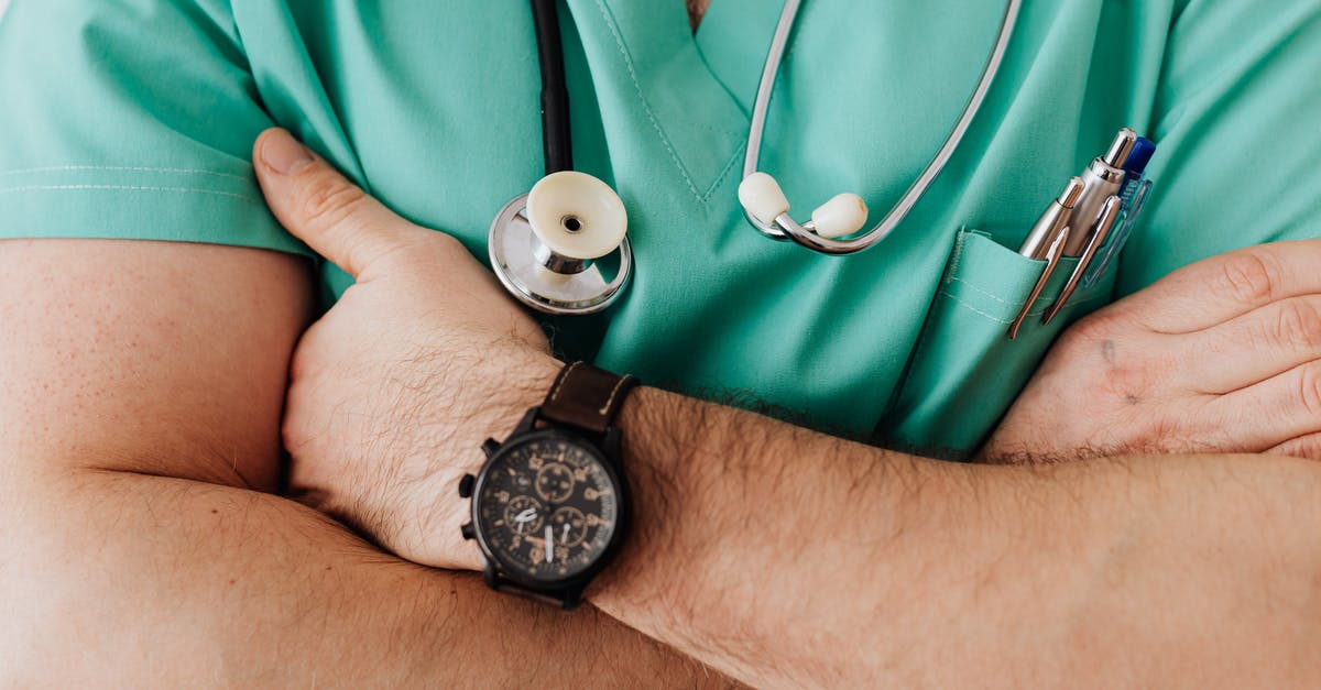 Is there any physician at SFO who issues fit-to-fly certificates? - Crop unrecognizable male doctor with stethoscope