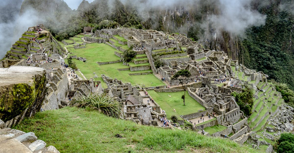 Is there any power plug that passengers may use on the Inca Rail train between Cusco and Machu Picchu in Peru? - Green Grass Field Near Mountain