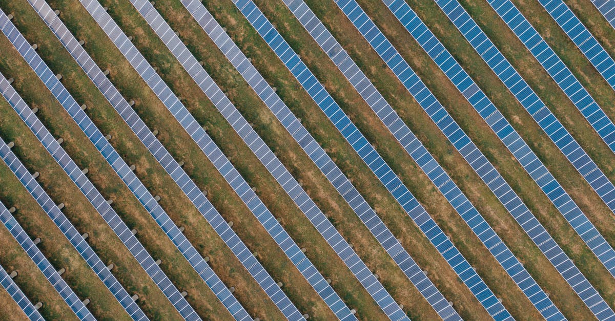 Is there any similar alternative to Zanzibar, in Tanzania? - Textured background of solar panels in countryside field