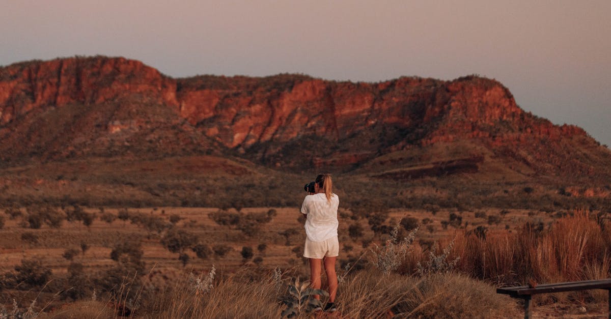 Is this back to back ticketing or throwaway ticketing? - Woman in White Long Sleeve Shirt Standing on Brown Grass Field