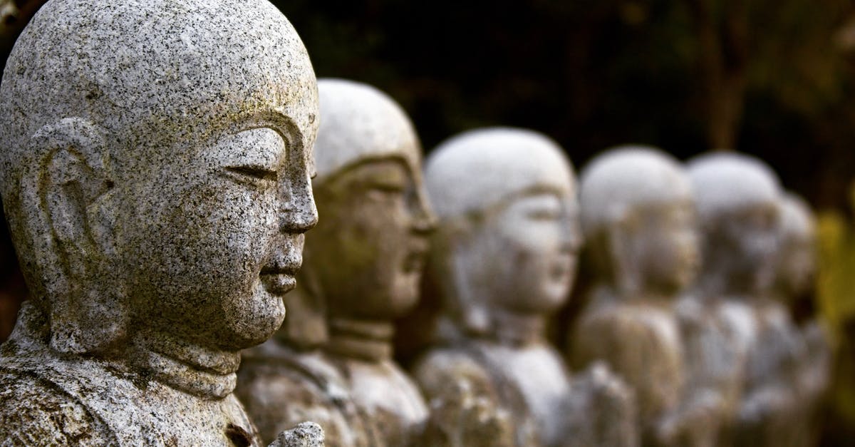 Is transiting in Japan still possible? - Concrete Statue in Close Up Photography