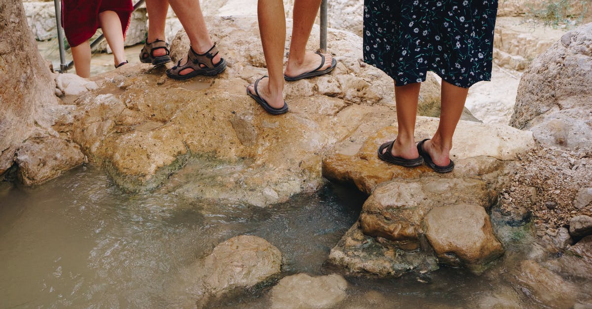 Israel tourist visa renewal - Photo of People Standing Near Body of Water