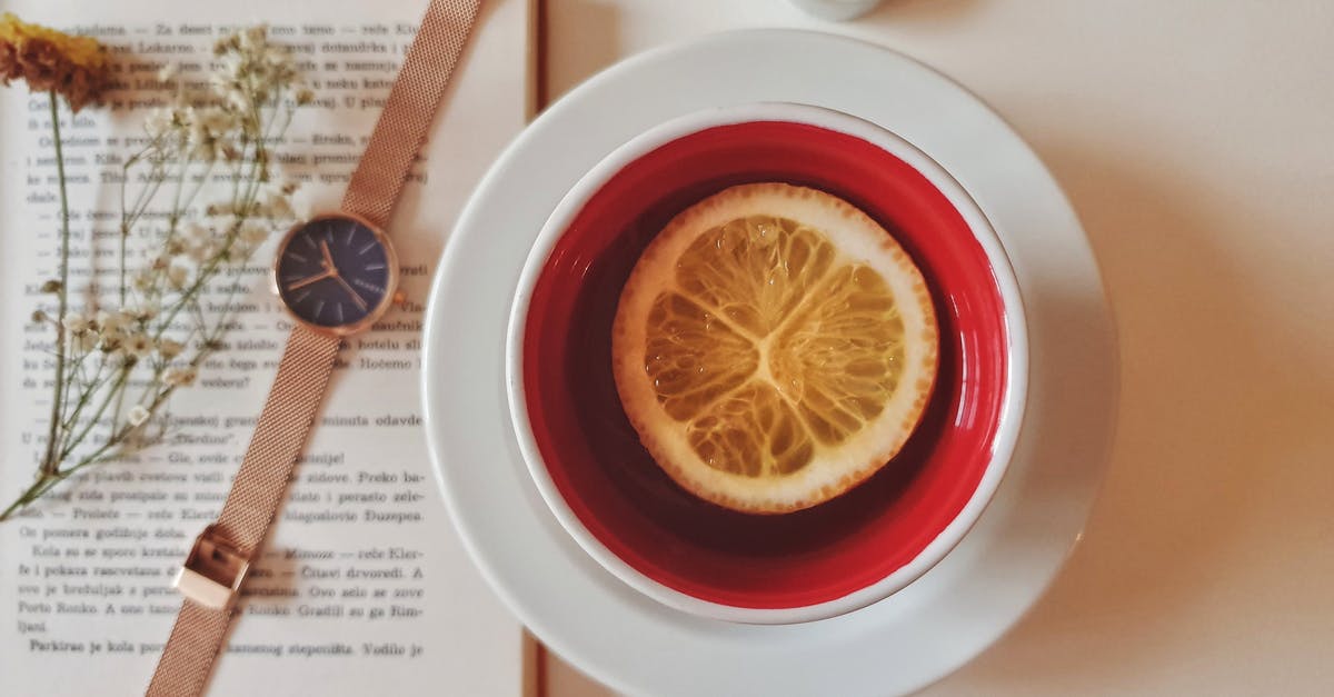 Istanbul-Belgrade, Serbia - Photo Of Tea Cup Beside Watch