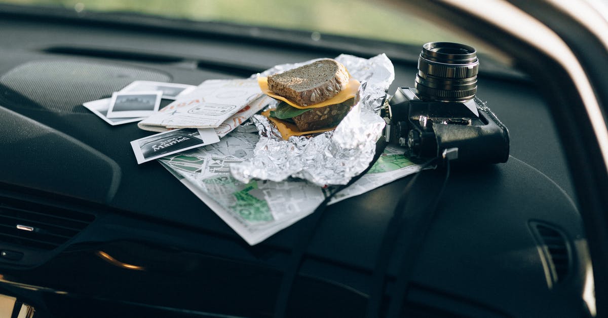 It is legal to have a dashboard camera in the UAE? - Photo of a Sandwich Beside a Black Dslr Camera