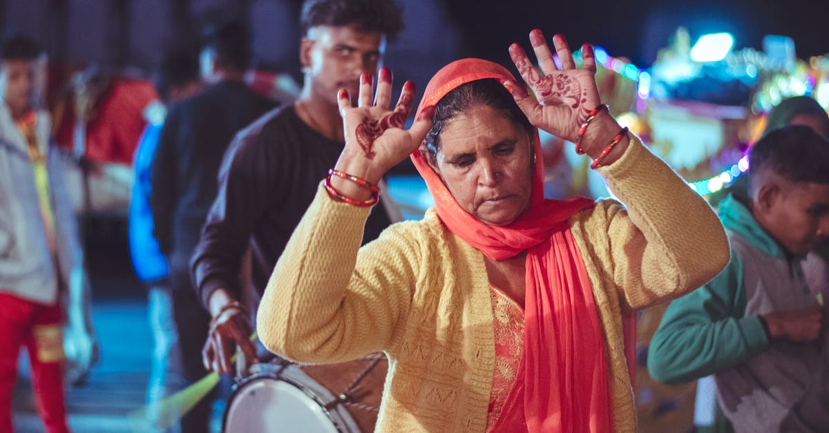 Jamaica visa requirement for Indian citizen - Man in Yellow Sweater With Red Scarf