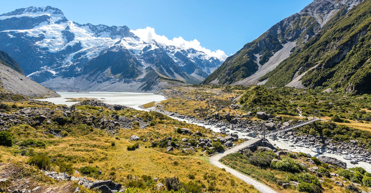 Japan's snow road: Where is it and when to visit? - Body of Water Between Mountain