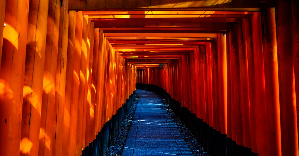 Japanese Ema and Omamori Shrine Charm Guide - Blue and Orange Wooden Pathway