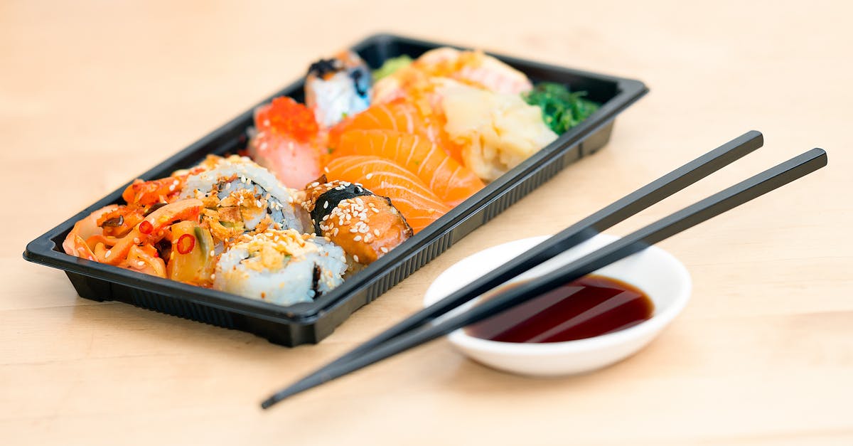 Japanese food "best before" codes - Close-up Photo of Sushi Served on Table