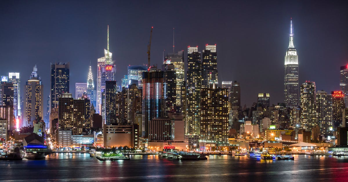 JFK airport to downtown Manhattan at night - City Lights Under Night Sky