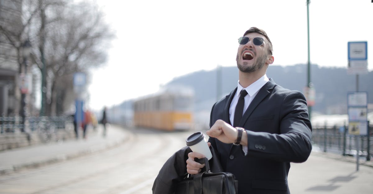 Keurig and K-Cups in Checked Luggage - Man in Black Suit Jacket While Shouting