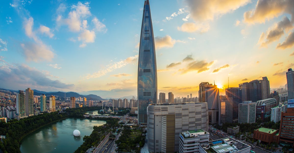 Korea: Visa required to go to the city while in transit in Seoul for a Philippine citizen? - Buildings and Body of Water during Golden Hour