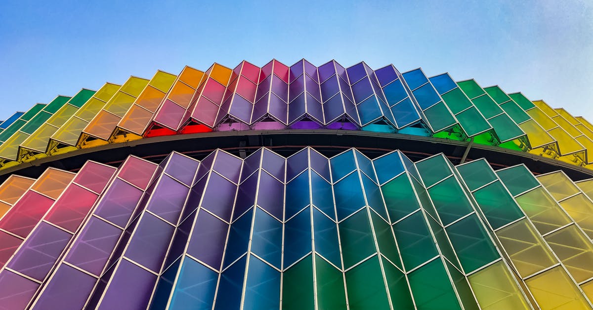 Kuala Lumpur (Malaysia) to Sumatra (Indonesia) by roro ferry - Blue and Yellow Glass Walled Building