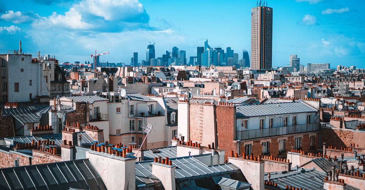 Last minute reservation of hostels in France - Aerial View of City Buildings Under the Blue Sky